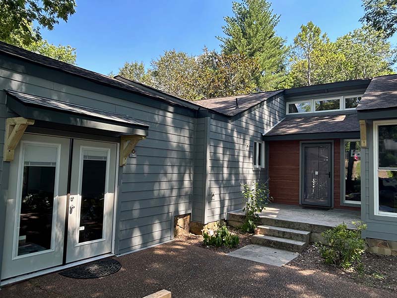 Ranch style home with new french doors and siding