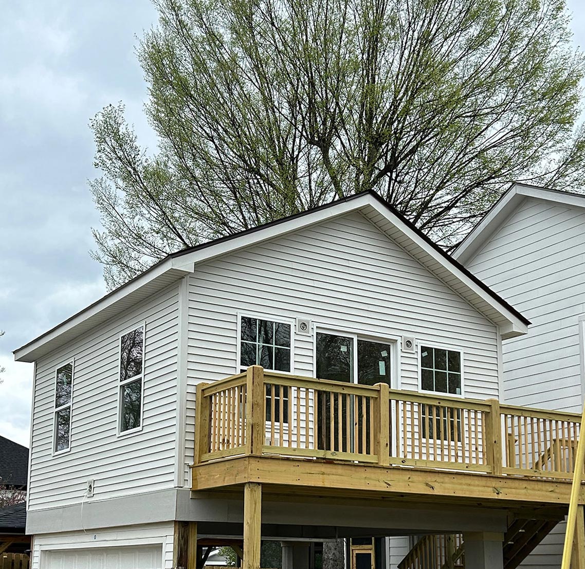 White siding installed on garage