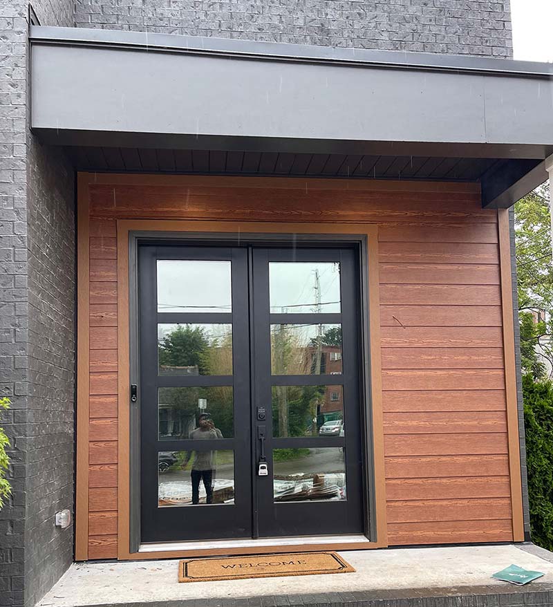 Custom Sidin installation wood framed around entry way