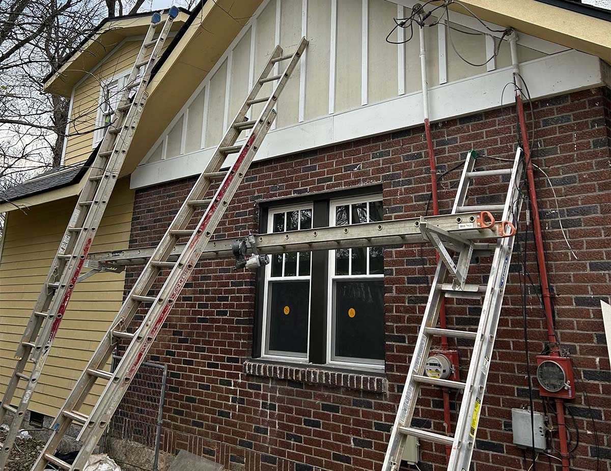 Ladders leaning up against a Nashville home getting siding repair