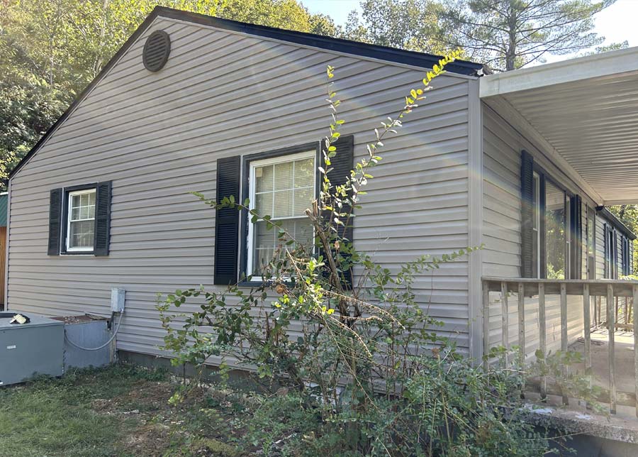 After image of a completed insurance claim project with a siding replacement on the right side of an Ashland City home