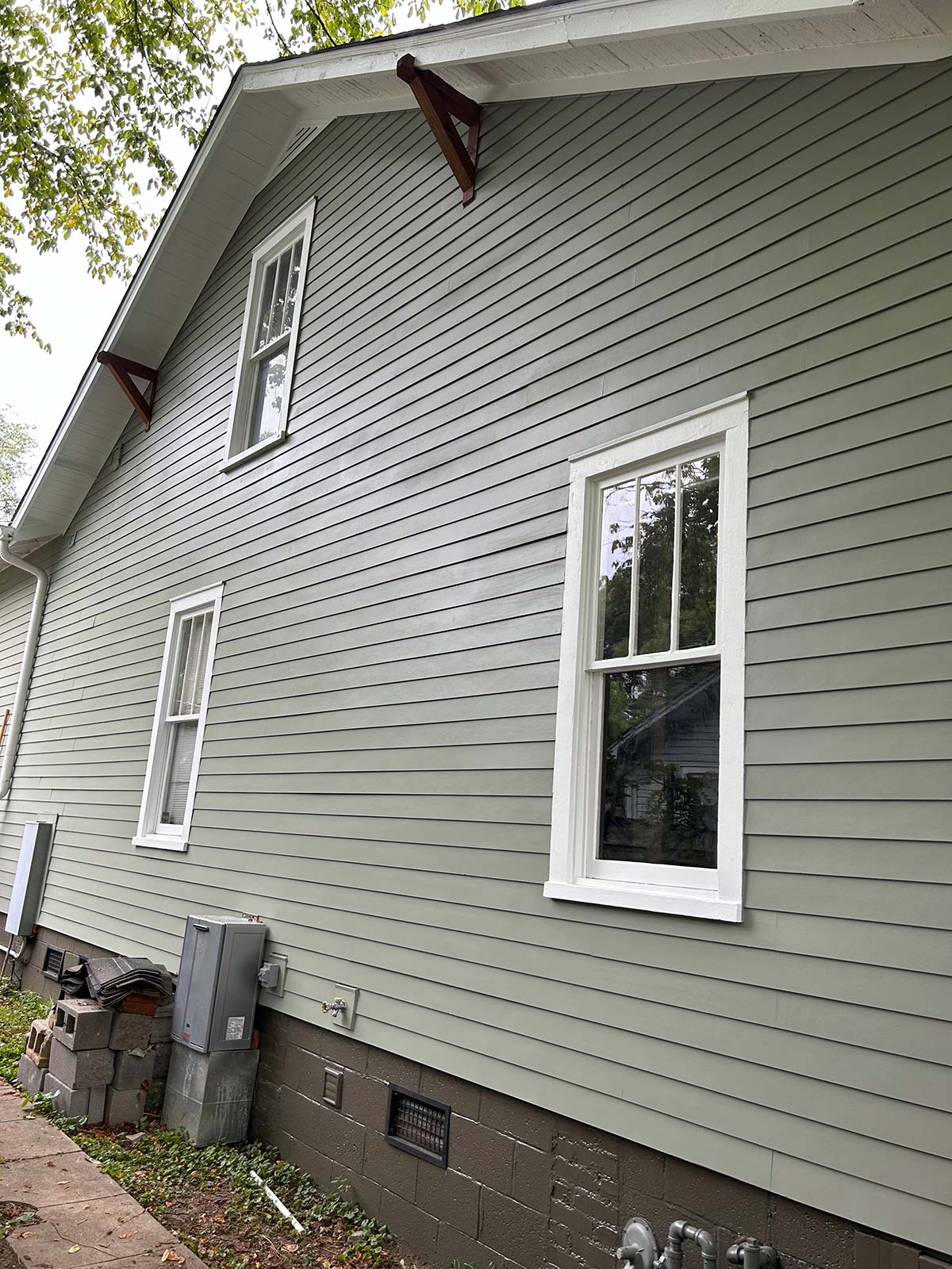 The Illinois Project After - Located in The Nations Neighborhood in North West Nashville - After image showing the new James Hardie Siding installation on the side of the home