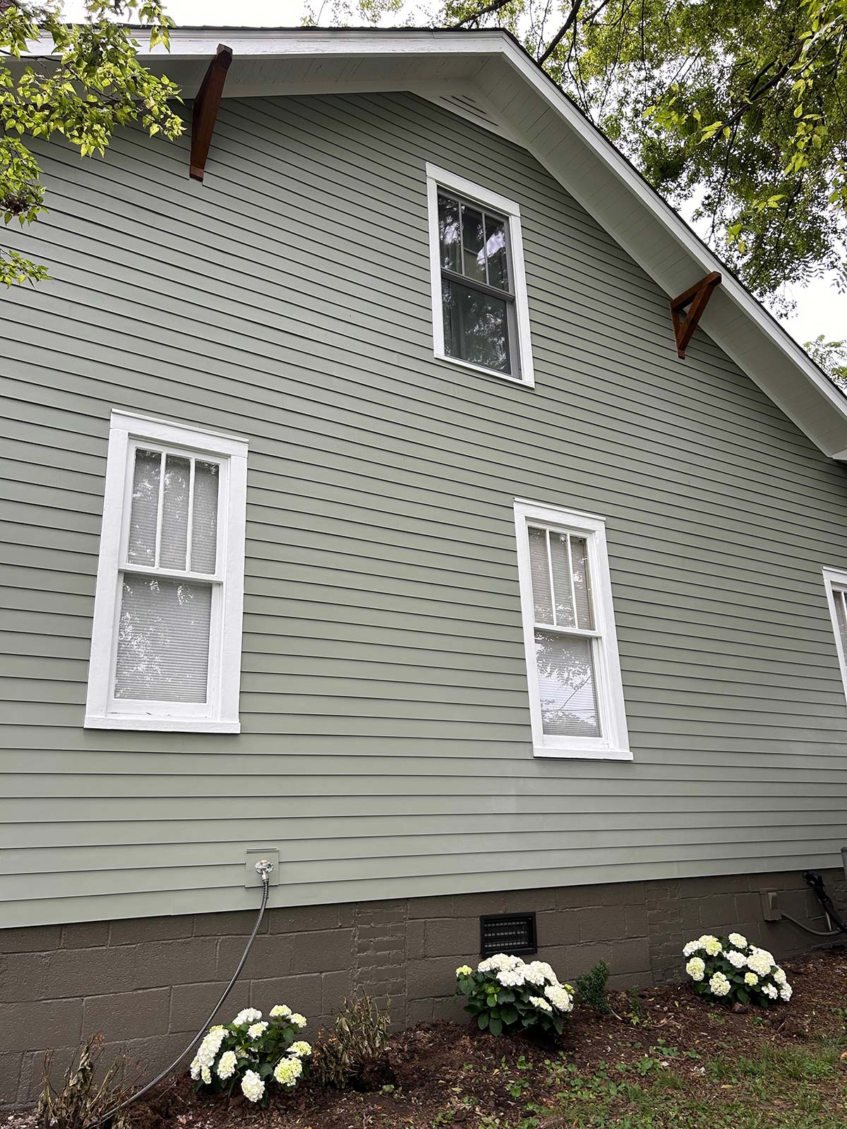 The Illinois Project After - Located in The Nations Neighborhood in North West Nashville - After image showing the new James Hardie Siding installation on the long side of the home
