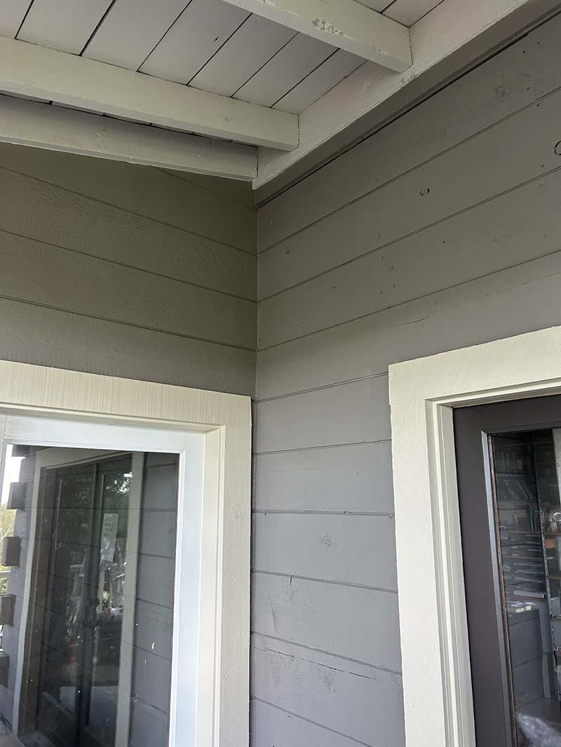 Close up image of siding installation under patio